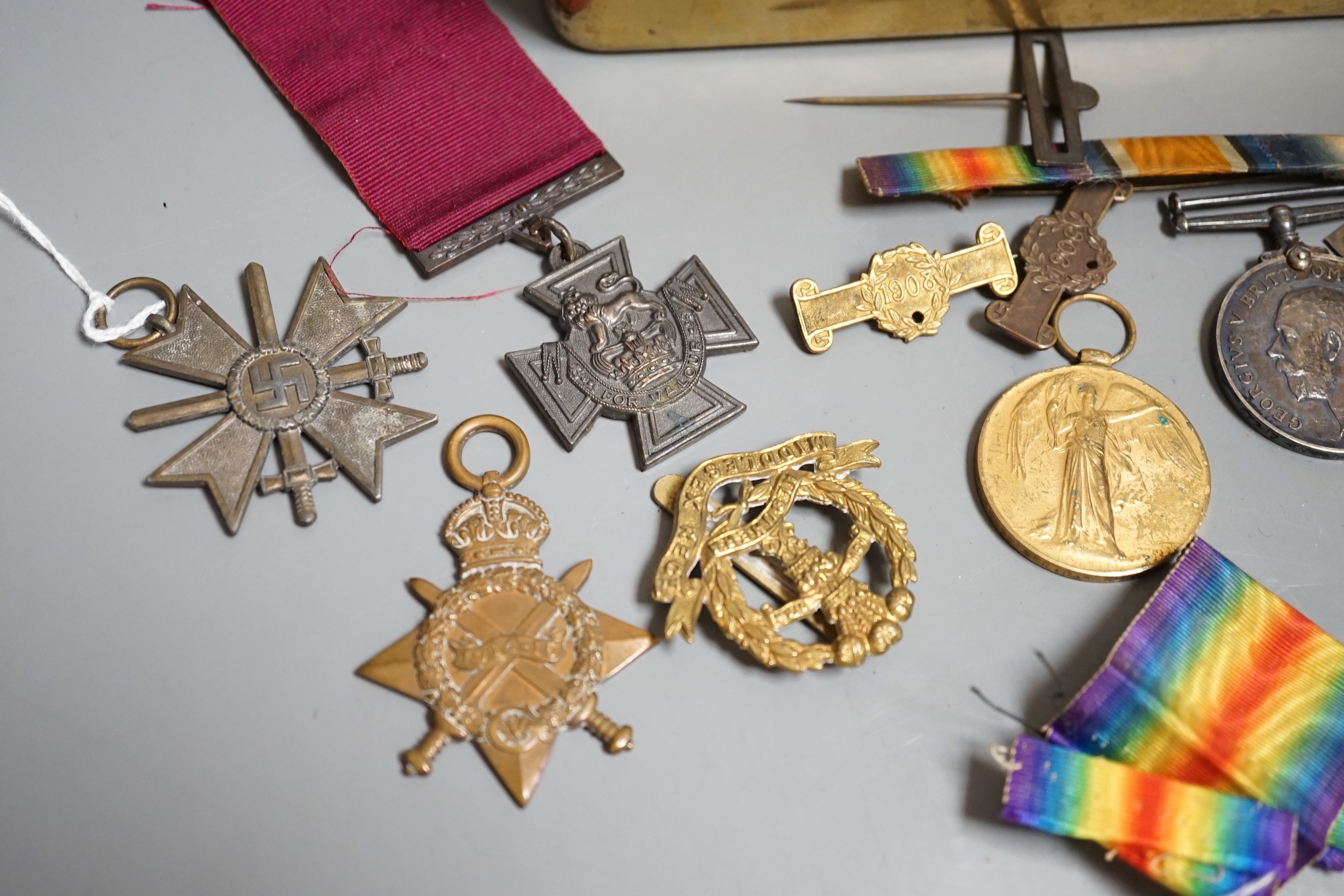 A WWI medal trio awarded to 4483 PTE. F. E. SHARP. 24 - LOND. R., an allied victory medal and matching British war medal awarded to 57292 GNR. D. KENDALL. R. A. with an honourable discharge certificate given to 5723 J. O